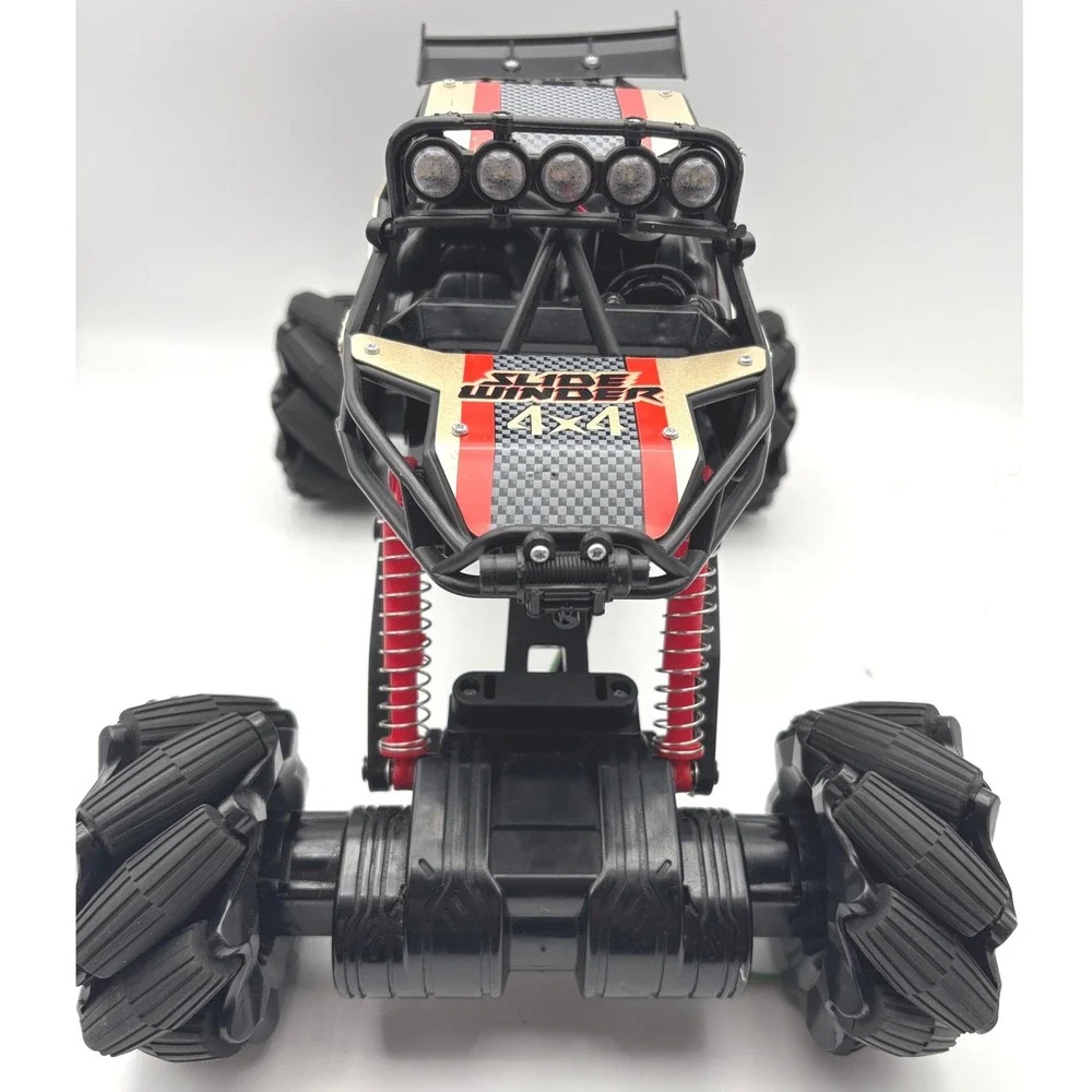 New Bright Slide Winder 4x4 RC Monster Truck Black Red Gold Roll Cage Toy